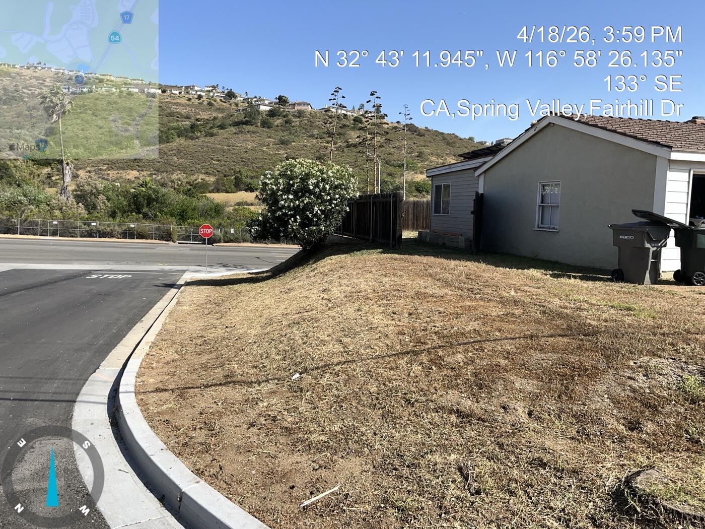 Wide view of cleared Spring Valley hillside